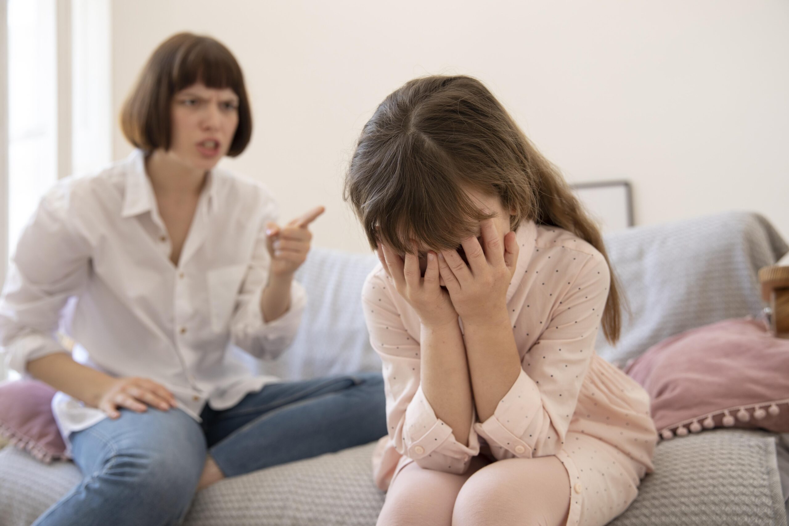 medium-shot-upset-mother-scolding-daughter